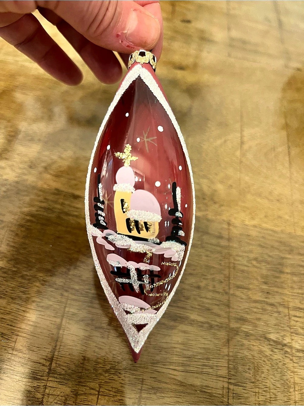 Vintage hand-painted teardrop or rocket-shaped glass Christmas ornament